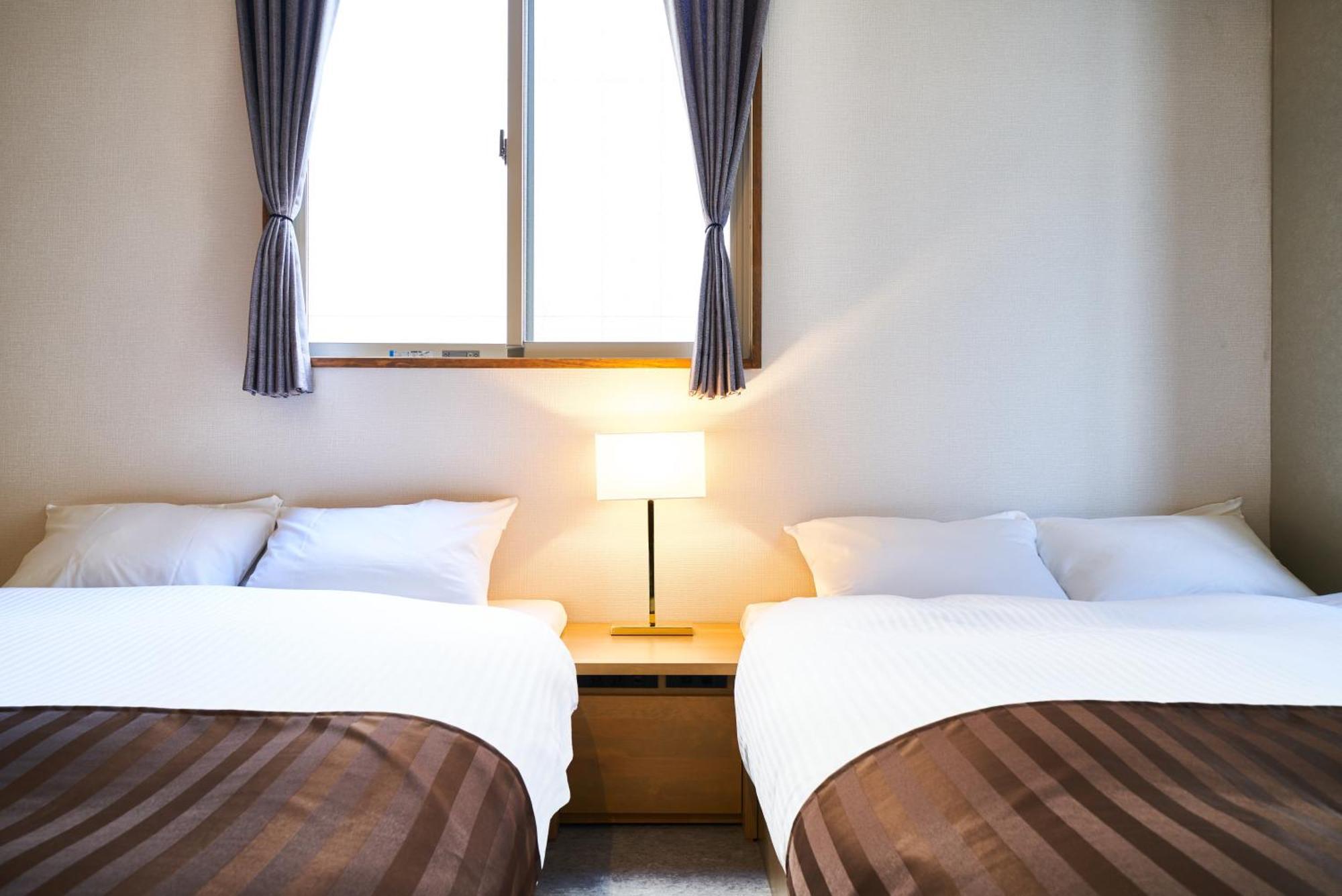 &And Hostel Shinsaibashi East Oszaka Szoba fotó